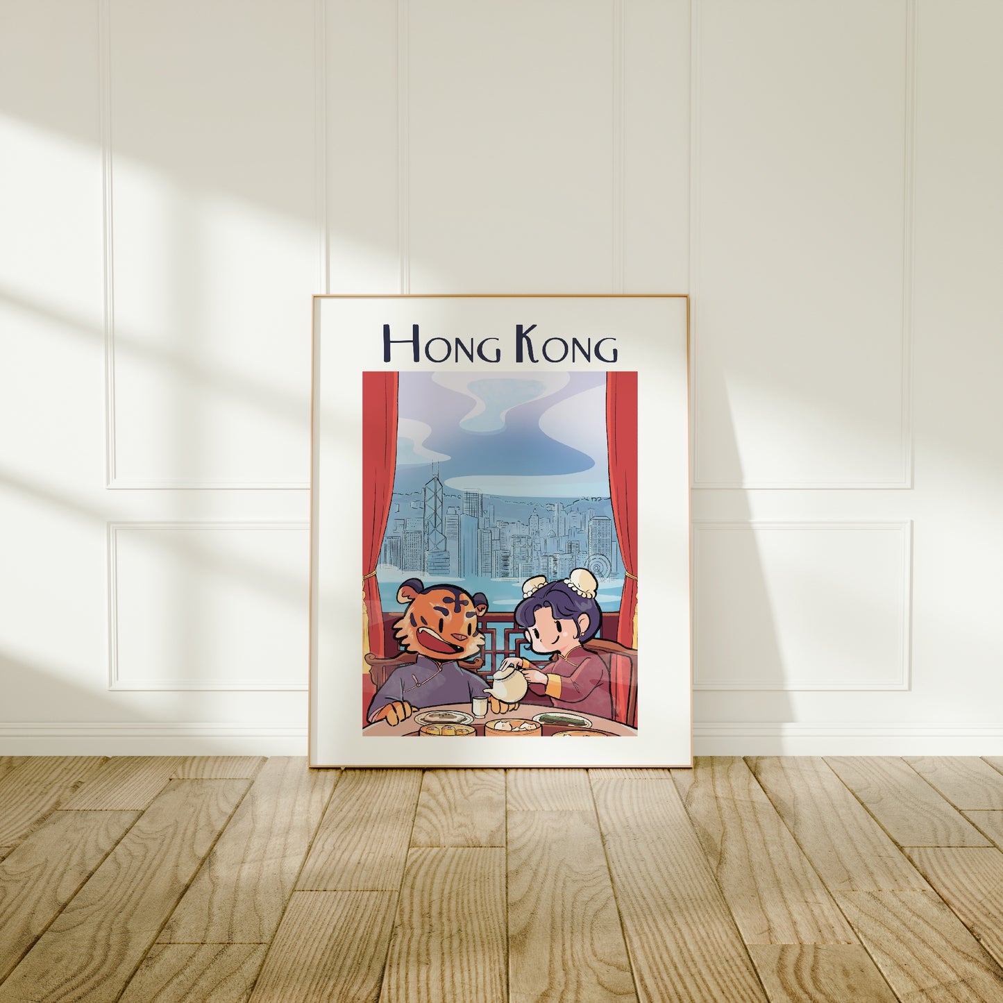 Large frame of the Hong Kong City poster leaning against a wall on a wooden floor