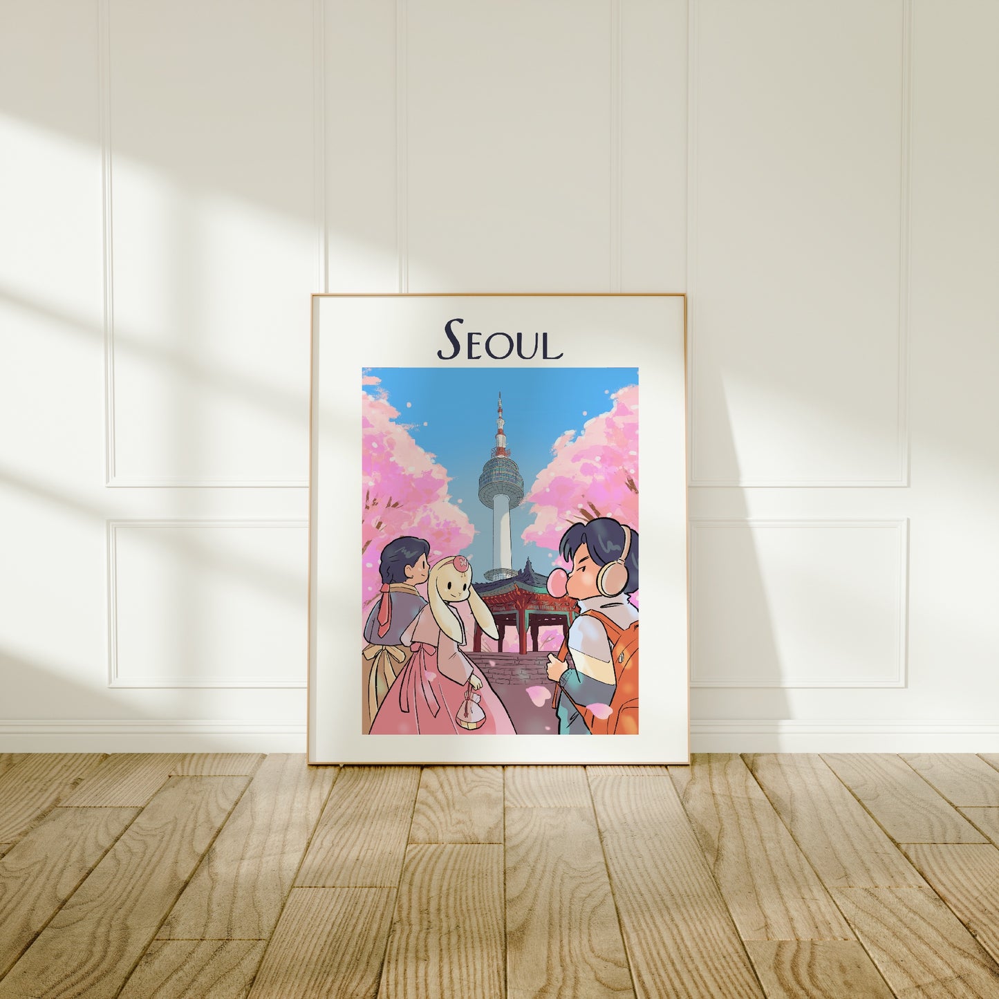 Large frame of the Seoul City poster leaning against a wall on a wooden floor