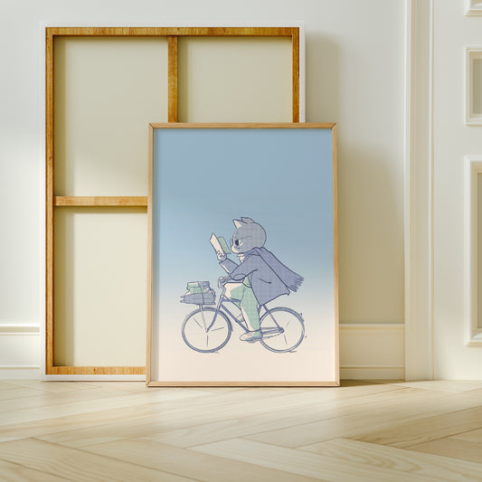 Extra Large frame next to canvas of the bookish biker print leaning against a wall on a wooden floor