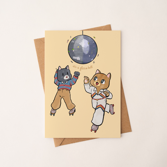 Birthday Card of Glitter Ball Cats on a kraft envelope in diagonal