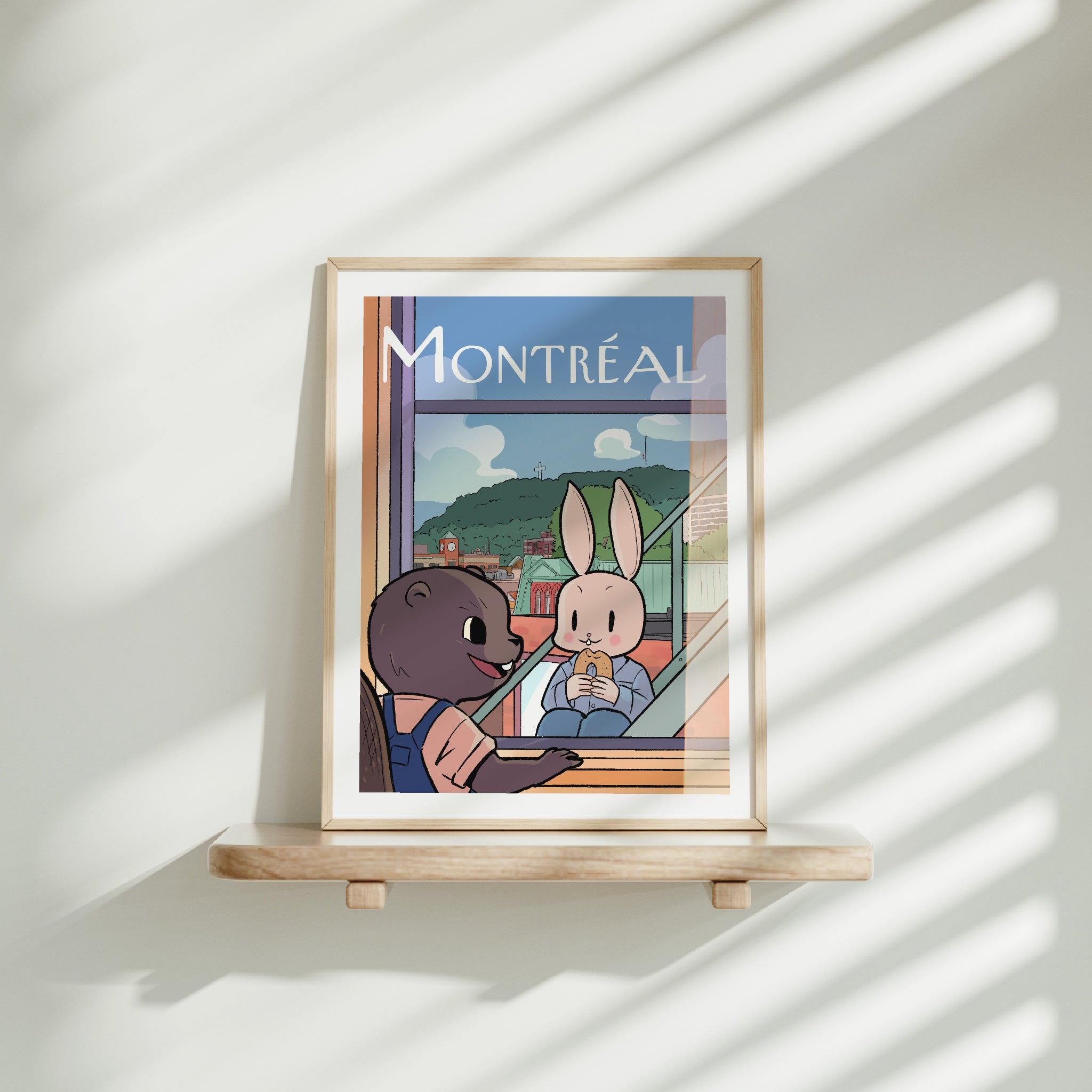 Medium frame of the Montreal city poster on a wooden shelf