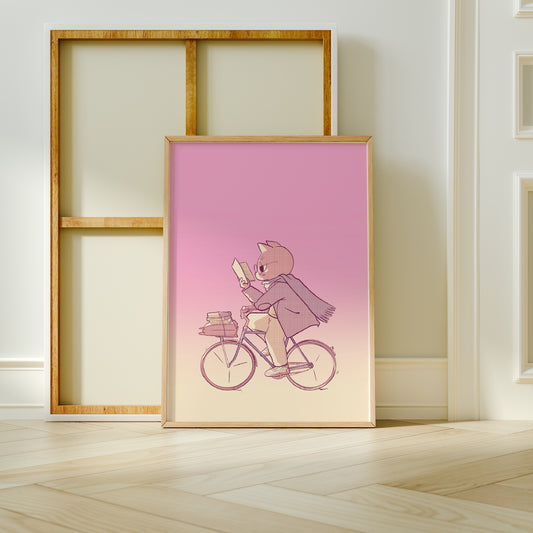 Extra Large frame next to canvas of the bookish biker print leaning against a wall on a wooden floor 