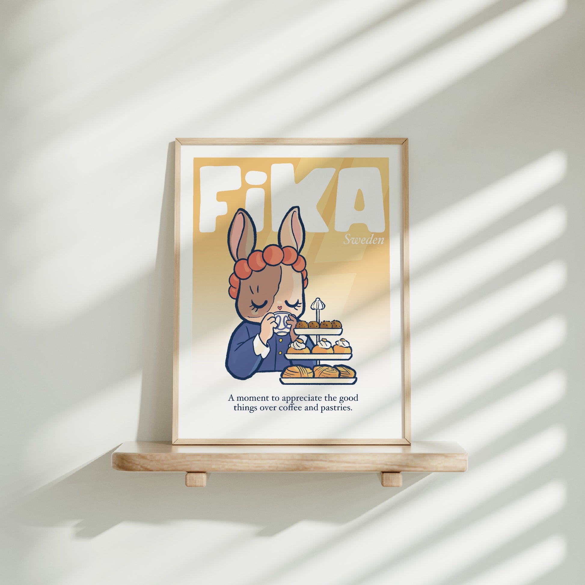 Medium frame of the Fika Scandinavian poster on a wooden shelf