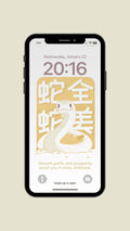 iPhone featuring wallpaper of the snake for lunar new year